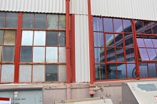 This is a BEFORE and AFTER image from the previous Hope’s® project at Pearl Harbor. Hope's created a new product line for the historic Pearl Harbor Naval Shipyard/Intermediate Maintenance Facility's (PHNSY/IMF) Building 155: the Hope’s ONE55™ Series Steel Windows (the same product line used in Building 9). The Building 155 preservation project was completed September 2013. PHOTO CREDIT (for this image only): Danielle Jones, Pearl Harbor Naval Shipyard/Intermediate Maintenance Facility